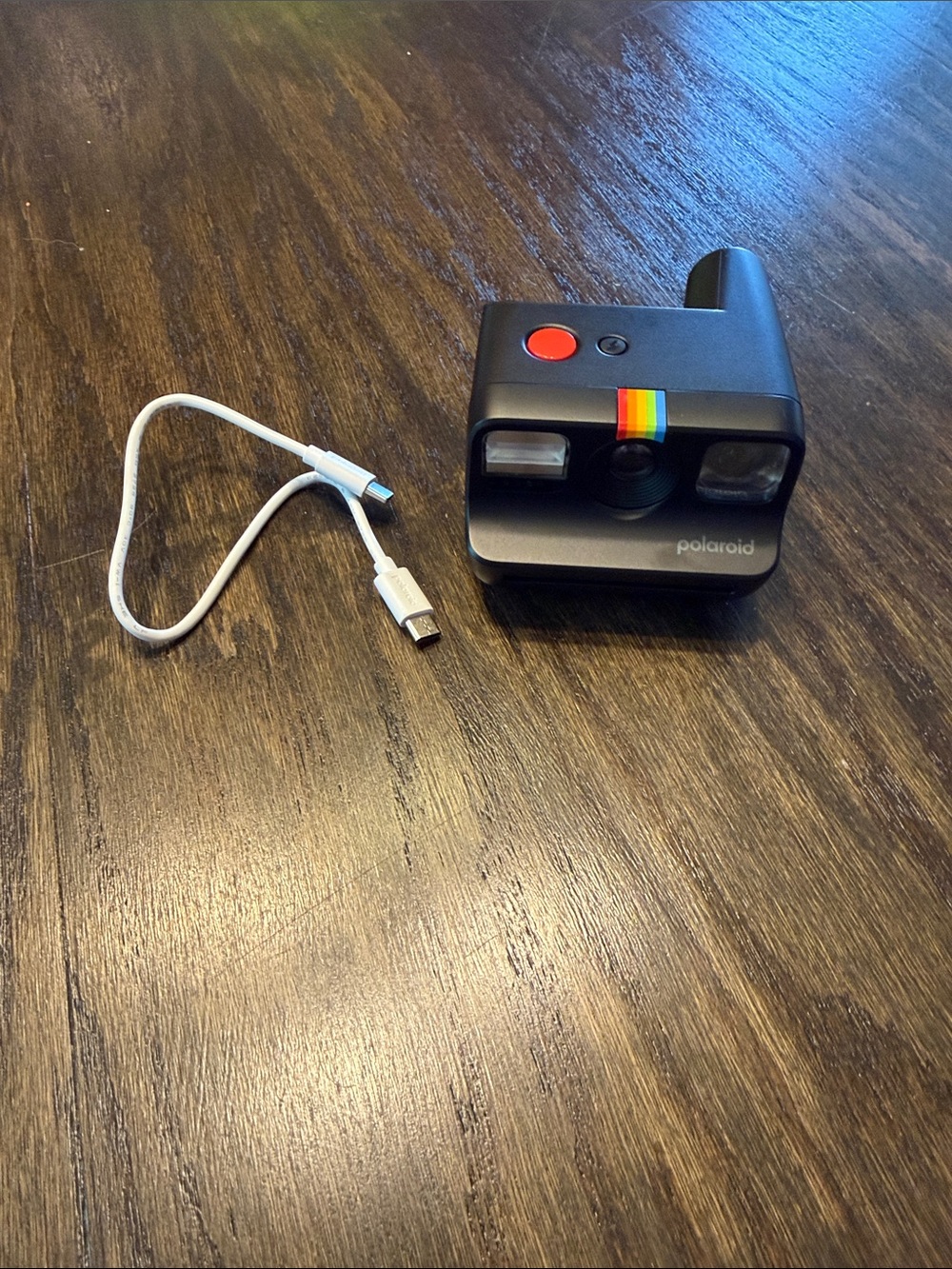 Polaroid Black Instant Camera with Rainbow Stripe Accent